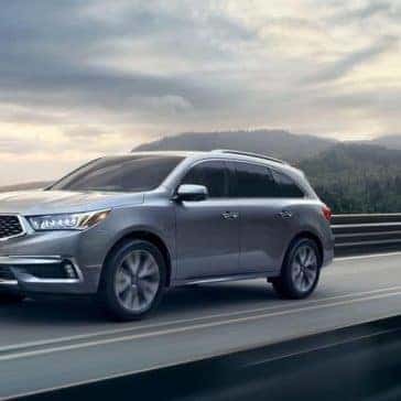 Acura-MDX-2019-advance-lunar-silver-metallic-speeding