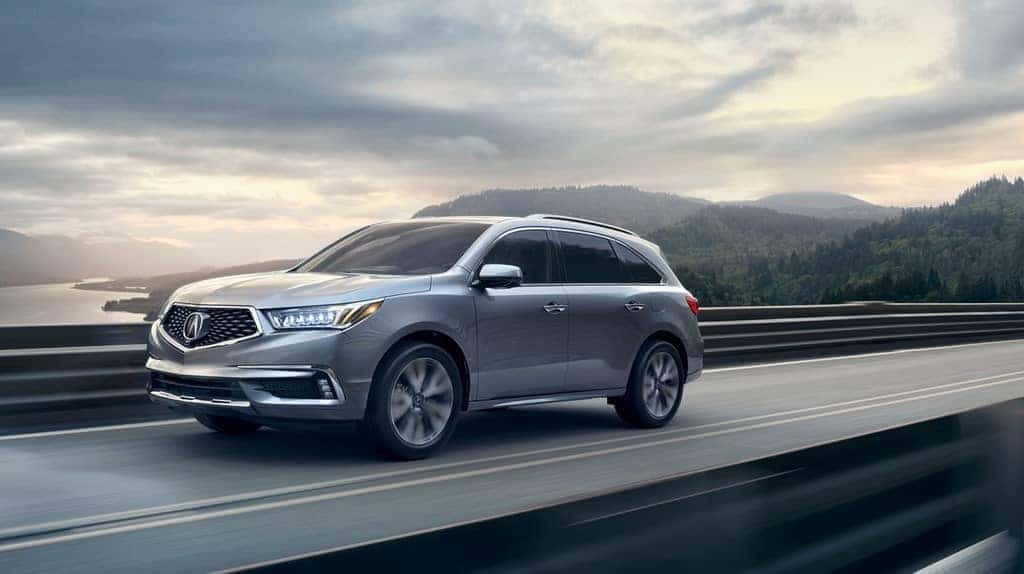 Acura-MDX-2019-advance-lunar-silver-metallic-speeding