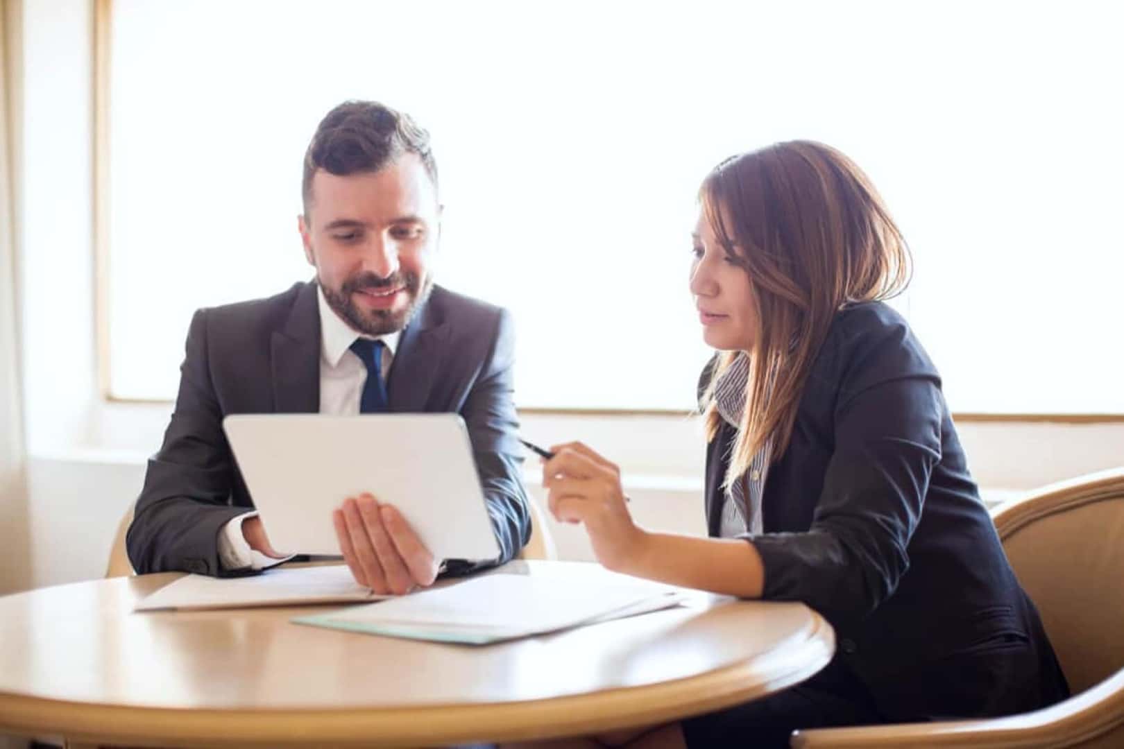 Man and woman going over document