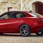 Alfa Romeo Giulia Parked Outside Brick Building