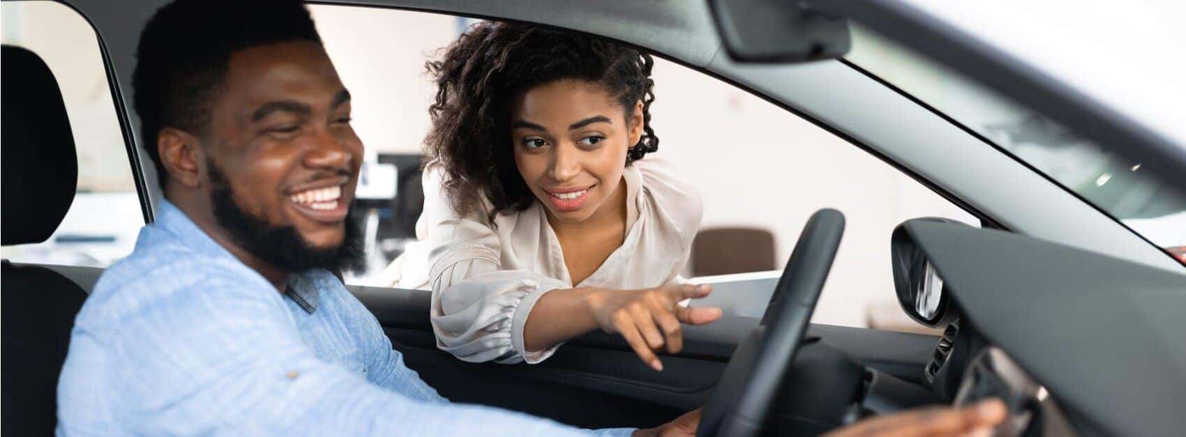 Happy Customer in Pre-Owned BMW Vehicle