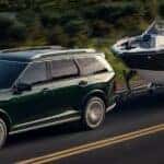 Front exterior view of a 2026 Hyundai Palisade towing a boat near Waukesha, WI