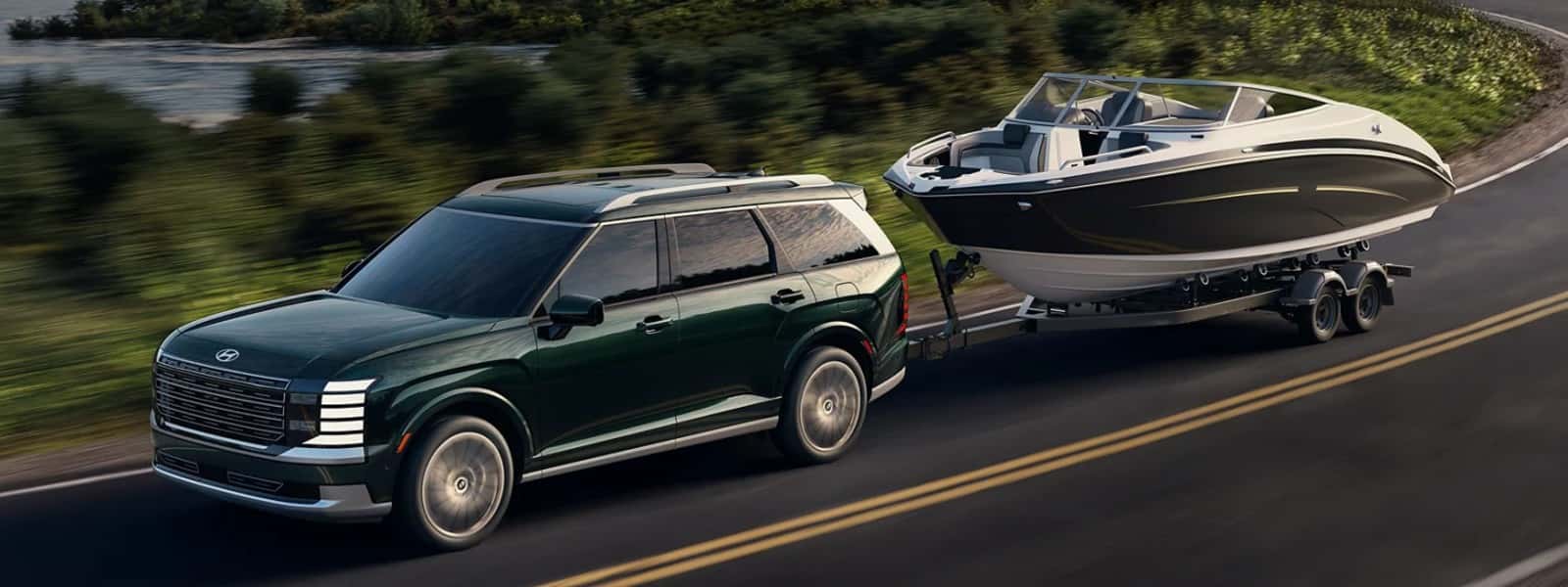 Front exterior view of a 2026 Hyundai Palisade towing a boat near Waukesha, WI