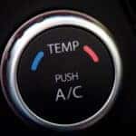 Image showing the air conditioning button in a new car