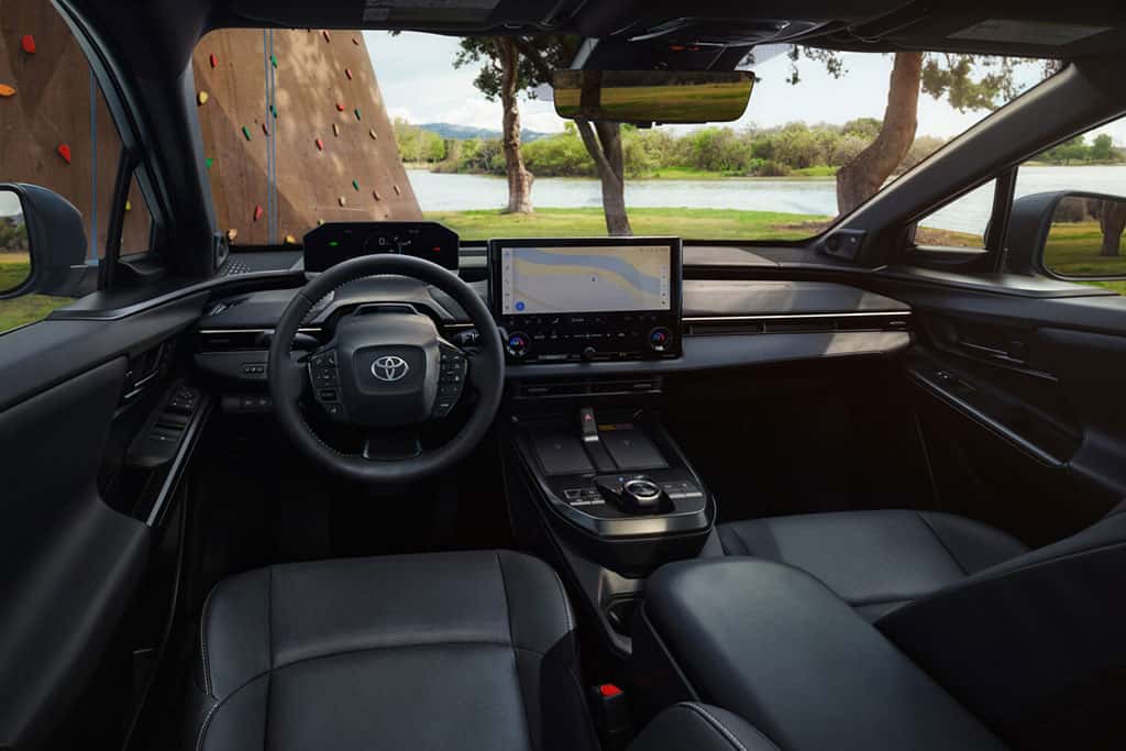 2026 Toyota bZ showing off interior and technology in front seats