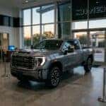 concept 2027 GMC Sierra 2500HD pickup truck parked at austin gmc dealer showroom