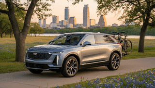 new cadillac vistiq SUV in park near austin texas.png