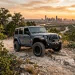 grey Jeep Wrangler Unlimited parked overlook in the Texas Hill Country