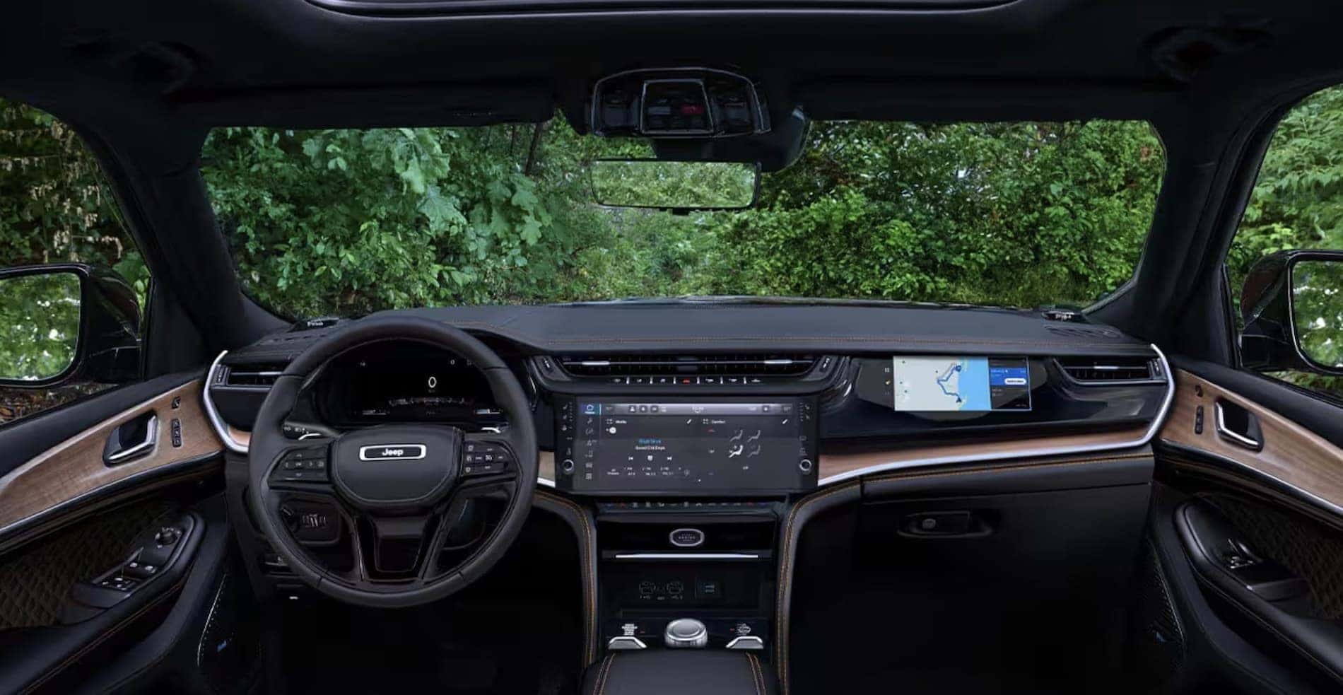 2026 Jeep Grand Cherokee cabin and Uconnect navigation display