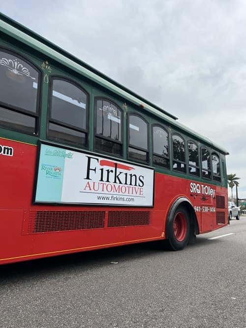 Trolley with Firkins Banner on Palmetto Bridge