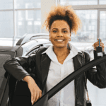 Happy Car buyer holding her keys