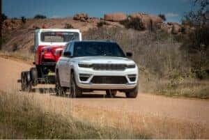 Grand Cherokee towing trailer with another vehicle