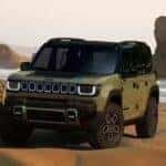 Jeep Recon driving on the sand