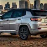 Jeep Compass parked on a beach