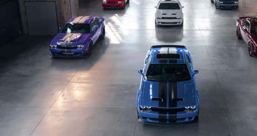 2023 Dodge Challengers parked in garage