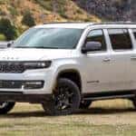 White Wagoneer parked in the grass