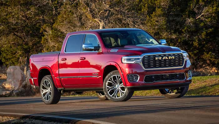 Red Ram 1500 parked on road