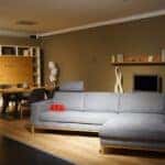 A living room filled with furniture and a flat screen tv