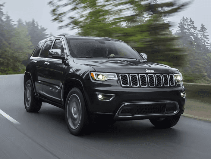 Black Jeep Grand Cherokee on the road