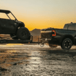 2026 Ram 1500 towing a vehicle