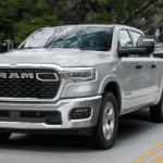 Silver 2026 Ram 1500 towing a trailer