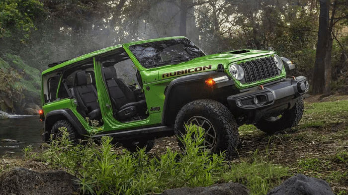 Gray 2026 Jeep Wrangler Rubicon driving off-road