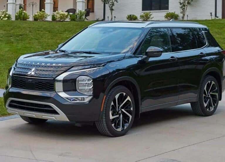 Mitsubishi Outlander parked in driveway