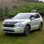 Mitsubishi Outlander parked in grass