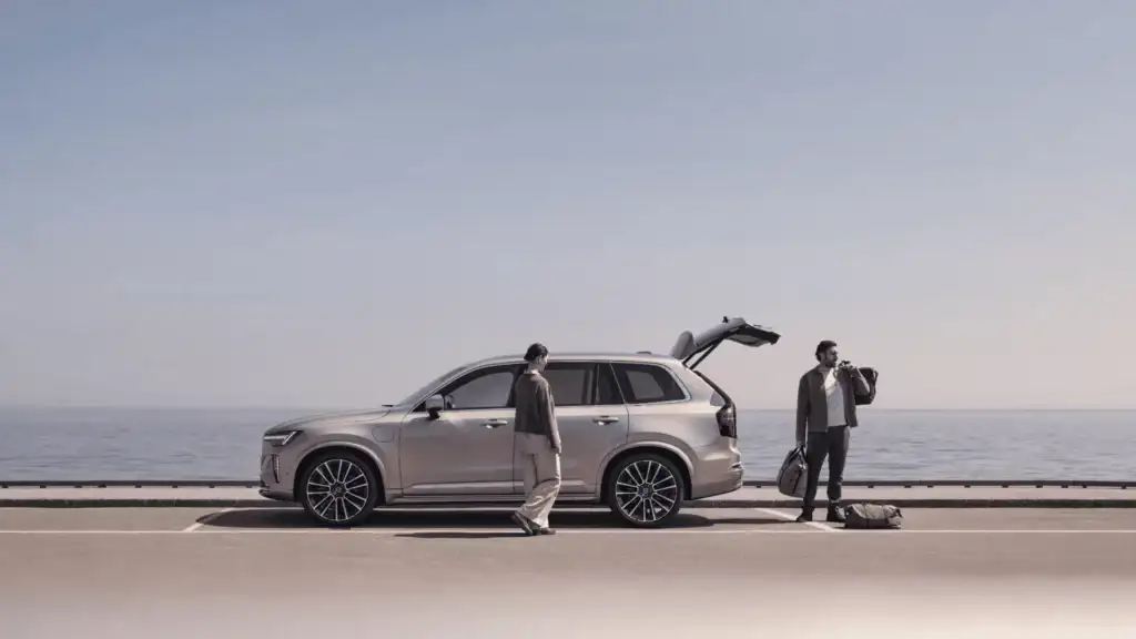 Side profile of the 2025 Volvo XC90 in Bristol TN with tailgate open, emphasizing luxury SUV design and passenger convenience.