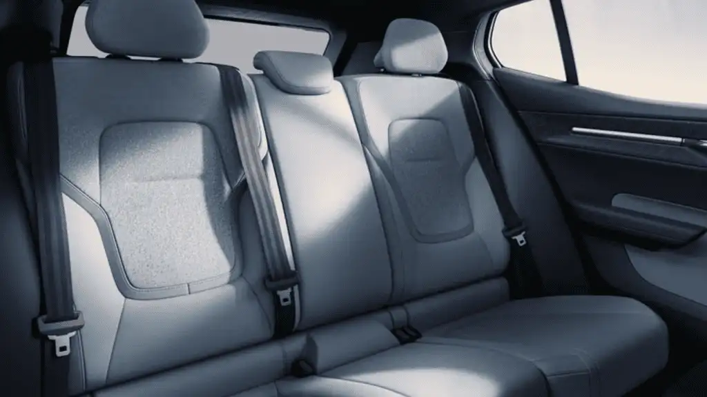 Rear seating of the 2025 Volvo EX30 highlighting adaptive interior lighting, premium materials, and ergonomic design for passenger comfort.