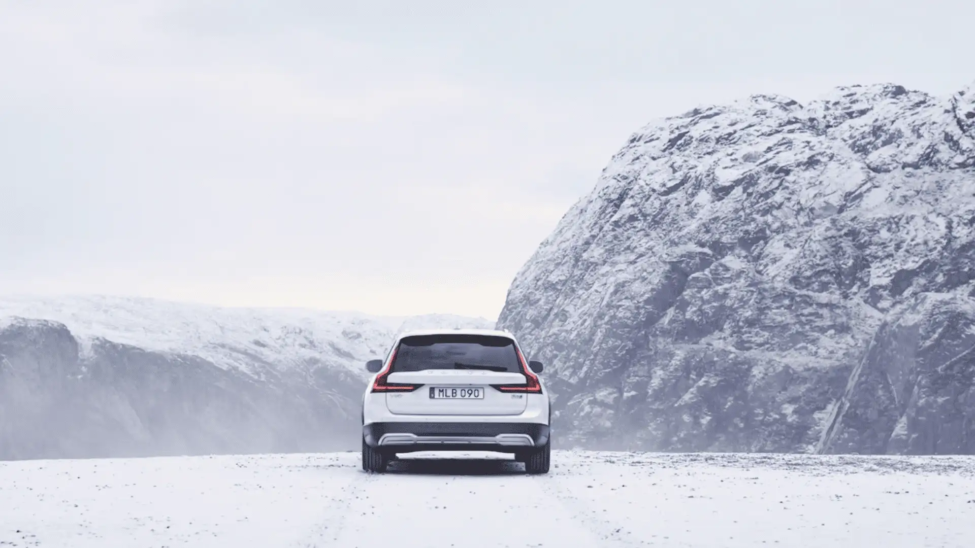 2025 Volvo V90 Cross Country luxury wagon in snowy mountain road near Bristol TN