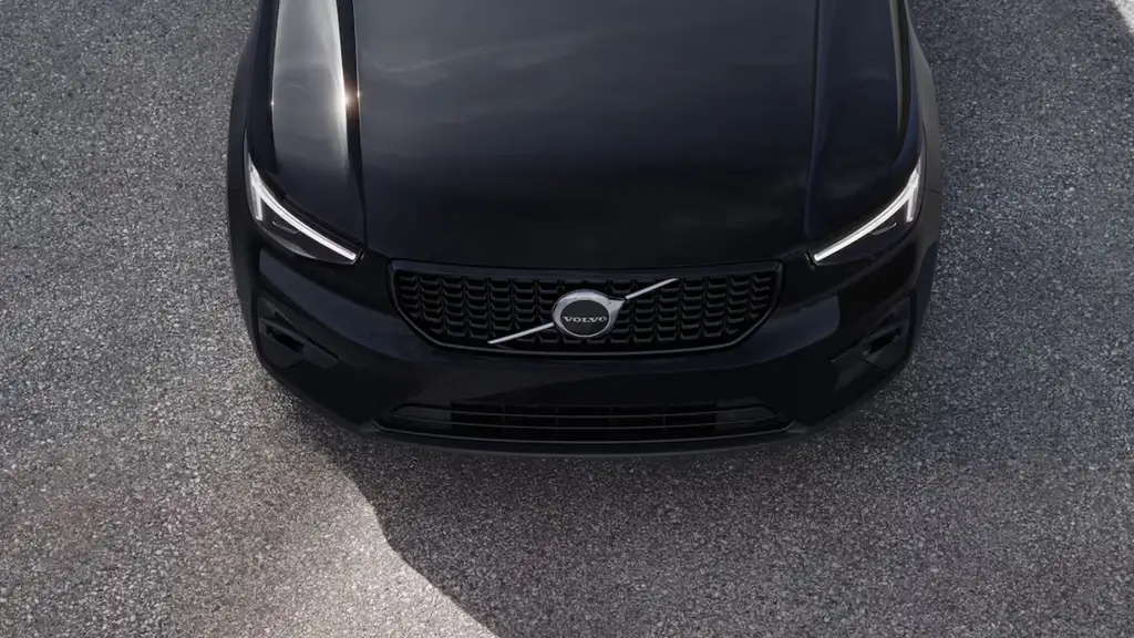 Front overhead view of the 2026 Volvo XC40 displaying signature grille design, LED headlights, and compact SUV proportions.