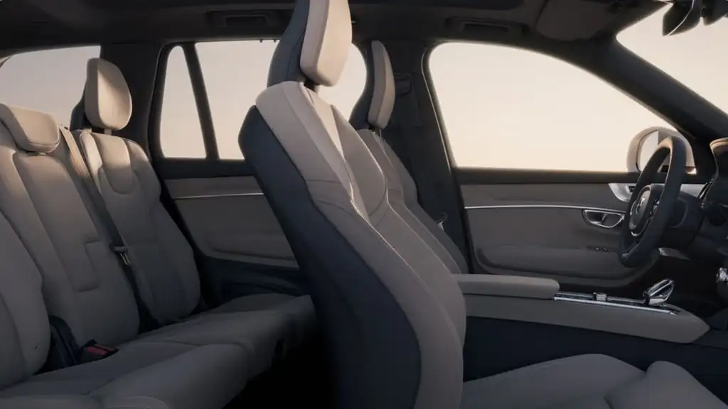 Side view of the 2026 Volvo XC90 interior highlighting front and rear seats, clean cabin design, and premium materials for everyday driving comfort.