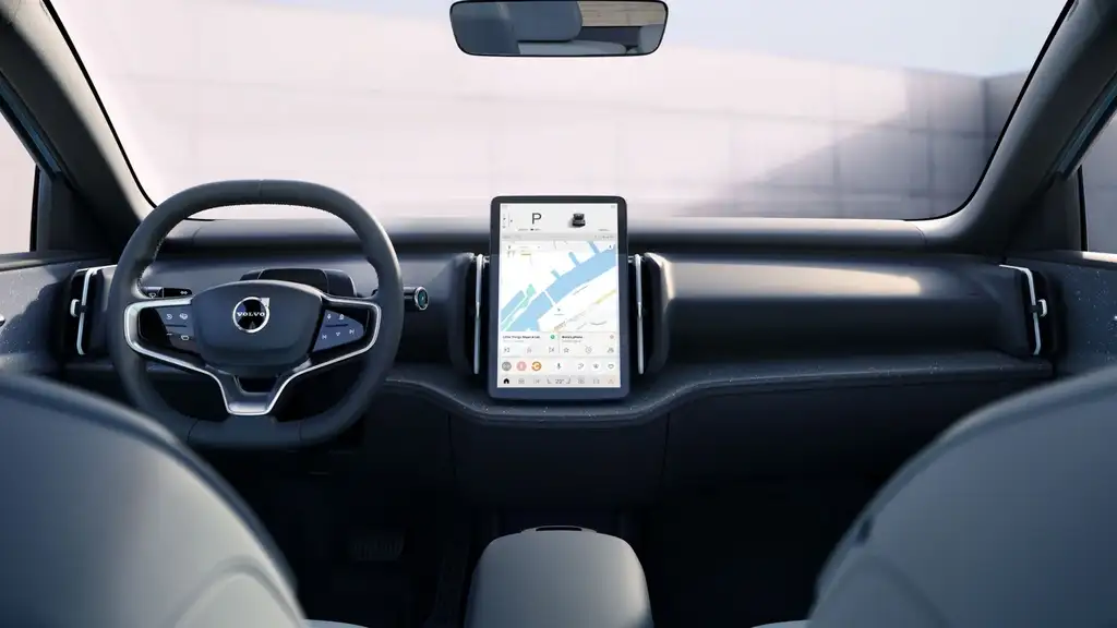 Interior dashboard of the 2026 Volvo EX30 featuring minimalist design, digital driver interface, and vertical touchscreen infotainment system.
