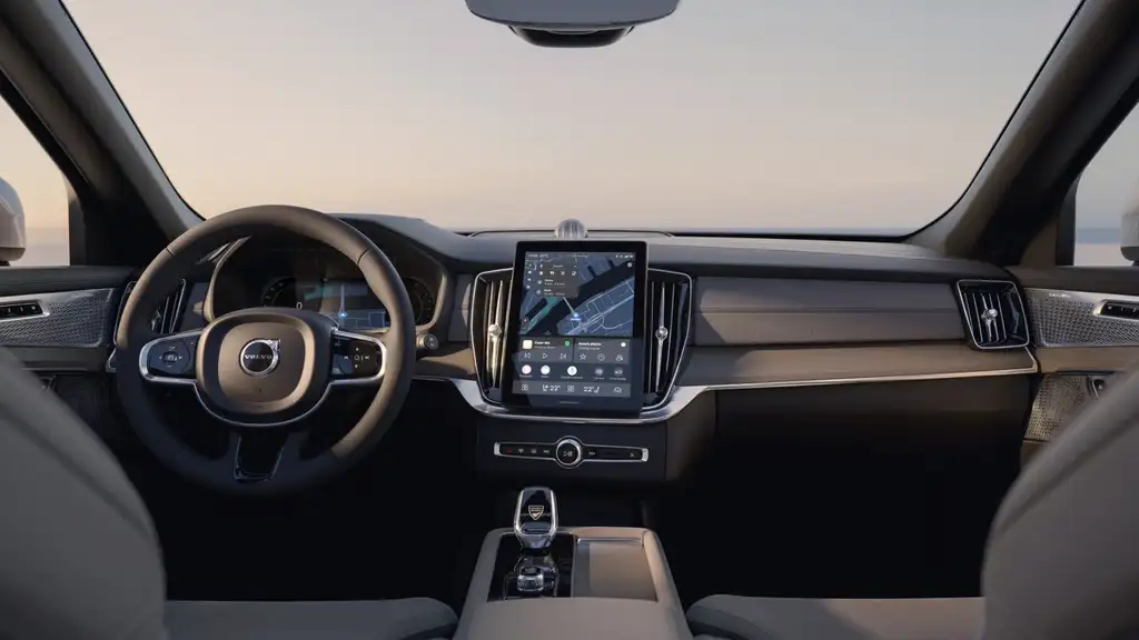 2026 Volvo XC90 dashboard with large vertical touchscreen navigation display and Volvo steering wheel near Johnson City, TN.