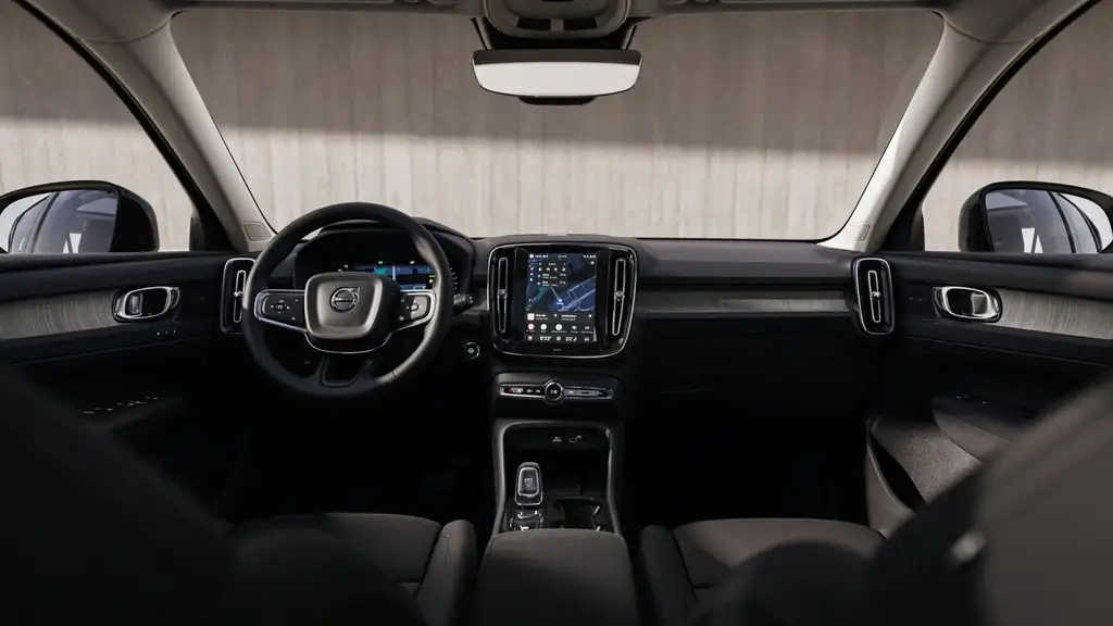 2026 Volvo XC40 interior dashboard with vertical touchscreen navigation display, minimalist controls, and clean Scandinavian cabin design