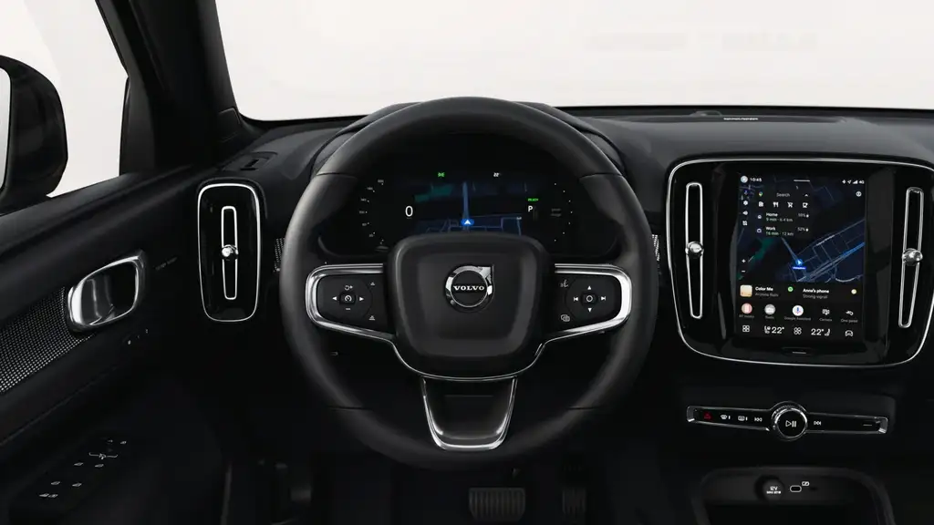 2026 Volvo EX40 electric SUV interior showing steering wheel controls digital driver display and portrait touchscreen infotainment near Asheville NC
