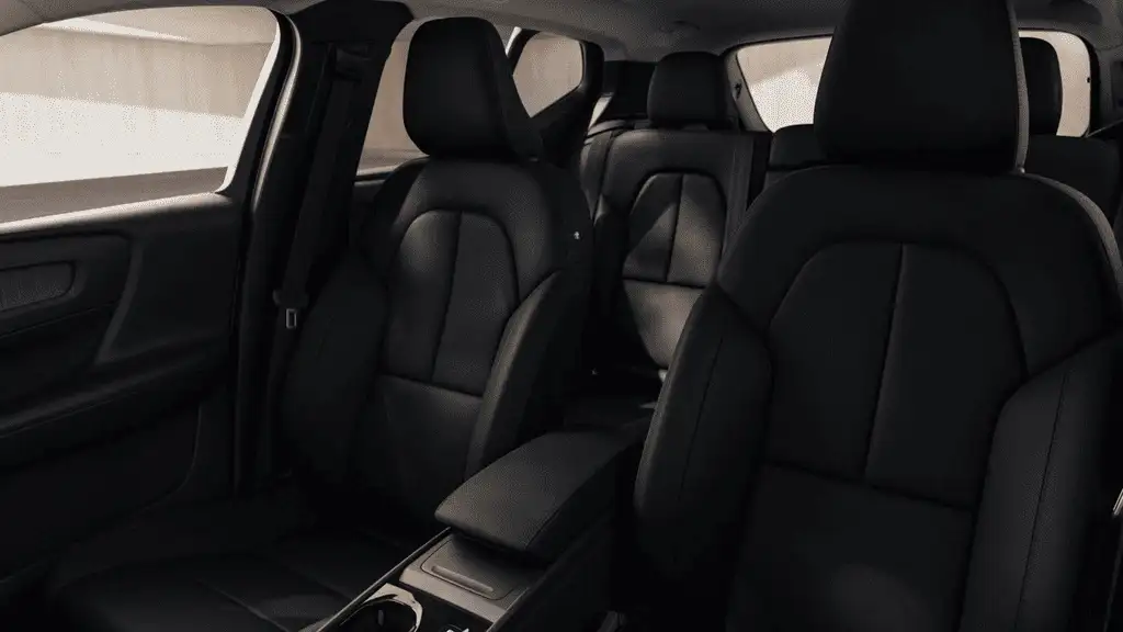 2026 Volvo XC40 black leather front and rear seats full cabin side view interior