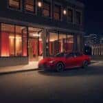 A parked 2026 Toyota Camry at night