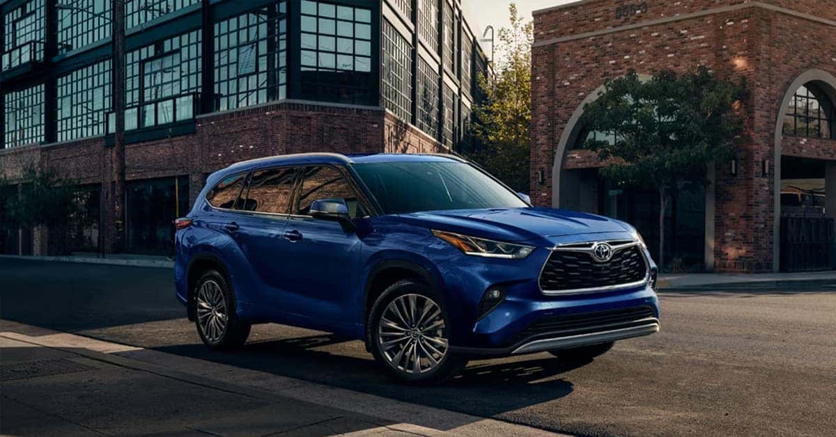 2026 Toyota Highlander driving on the streets