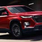 Red 2023 Chevy Traverse RS Front Exterior on a Freeway
