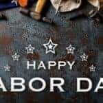 White Happy Labor Day Text on Steel Background with a Bunch of Tools