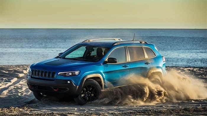 Jeep Cherokee Driving In Sand