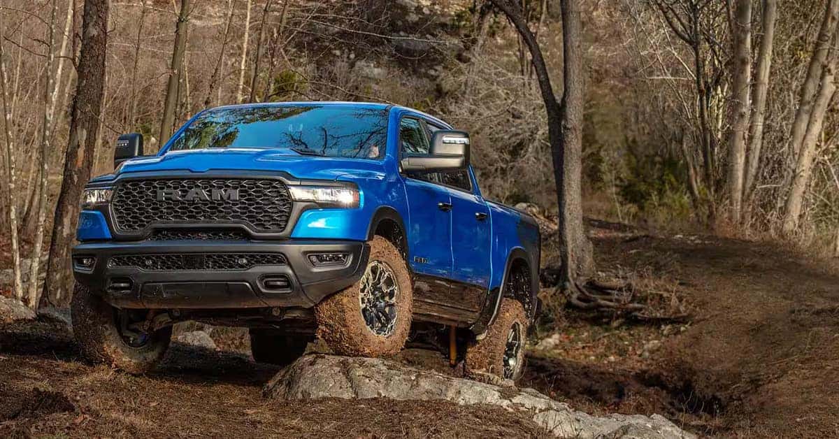 2025 Blue ram 1500 truck with muddy tires