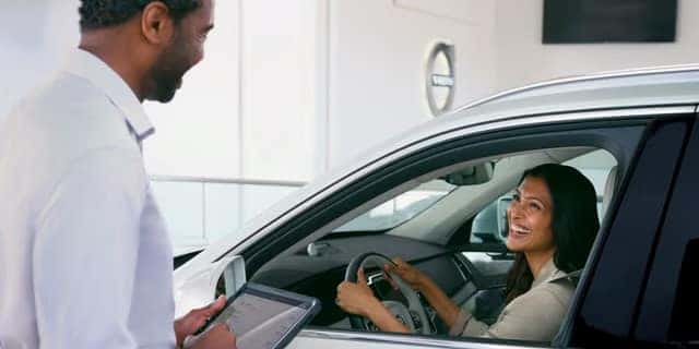 Person talking to a Volvo Service Advisor
