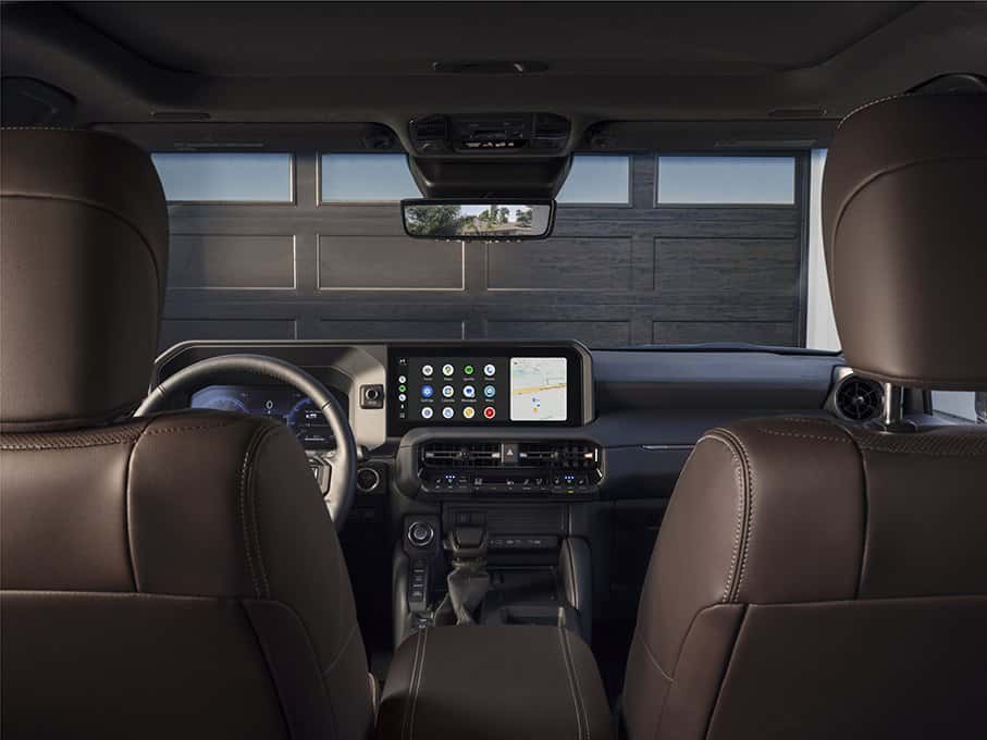 Front cabin of the 2027 Toyota Land Cruiser showing the center touchscreen and digital gauge cluster at Joseph Airport Toyota in Vandalia, Ohio