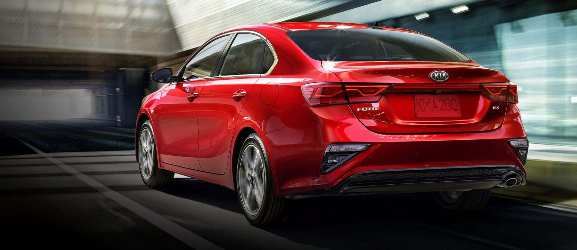 Kia_Forte_Red_Driving_CIty