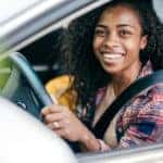 Woman test driving car