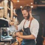 Male barista making cappuccino