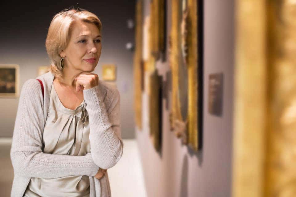 Woman looking at picture collection